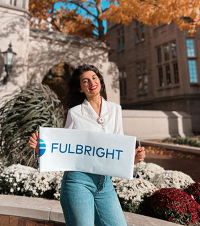 Close-up of the Fulbright brochure's custom layout, typography, and vibrant photography